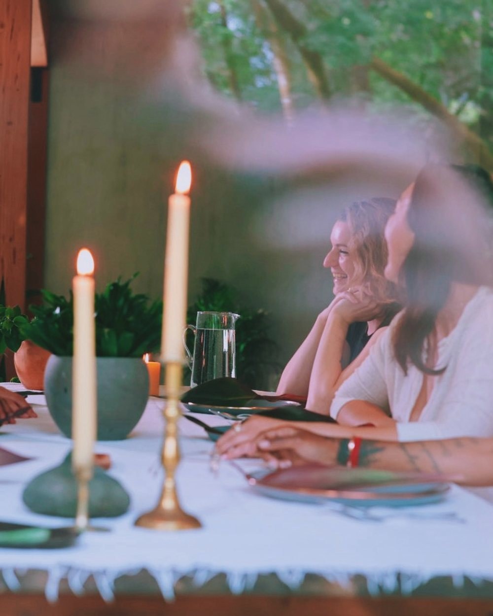 Conversation by candlelight at the long table